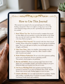 Person holding a tablet with a journaling guide on a wooden surface