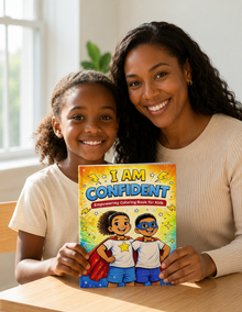 Mother and daughter holding I Am Confident coloring book
