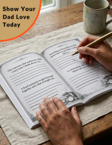 Person writing in a journal on a wooden table with a mug in the background