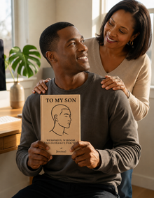 Man holding a wooden plaque with a woman standing behind him, in a home setting.